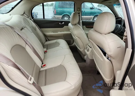 2000 Lincoln Continental z USA, uszkodzony, nr VIN 1LNHM97V2YY764261